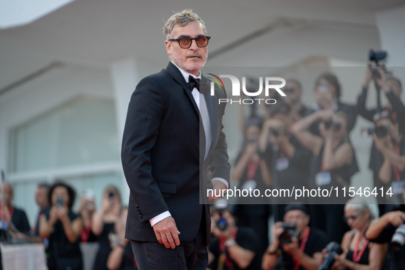 Joaquin Phoenix attends the ''Joker: Folie a Deux'' red carpet during the 81st Venice International Film Festival at Sala Grande in Venice,...