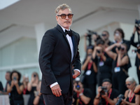 Joaquin Phoenix attends the ''Joker: Folie a Deux'' red carpet during the 81st Venice International Film Festival at Sala Grande in Venice,...