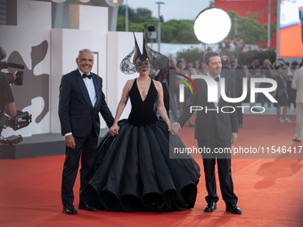 Venice Film Festival Director Alberto Barbera, Lady Gaga, and Biennale President Pietrangelo Buttafuoco attend the ''Joker: Folie a Deux'' r...