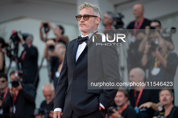 Joaquin Phoenix attends the ''Joker: Folie a Deux'' red carpet during the 81st Venice International Film Festival at Sala Grande in Venice,...