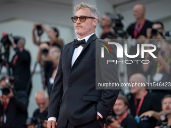 Joaquin Phoenix attends the ''Joker: Folie a Deux'' red carpet during the 81st Venice International Film Festival at Sala Grande in Venice,...