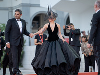 Lady Gaga and Michael Polansky attend the ''Joker: Folie a Deux'' red carpet during the 81st Venice International Film Festival at Sala Gran...