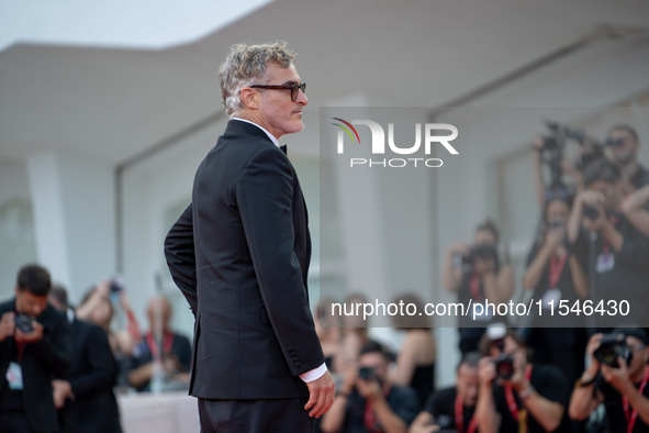 Joaquin Phoenix attends the ''Joker: Folie a Deux'' red carpet during the 81st Venice International Film Festival at Sala Grande in Venice,...