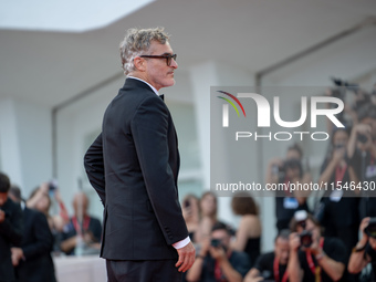 Joaquin Phoenix attends the ''Joker: Folie a Deux'' red carpet during the 81st Venice International Film Festival at Sala Grande in Venice,...