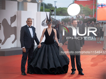 Venice Film Festival Director Alberto Barbera, Lady Gaga, and Biennale President Pietrangelo Buttafuoco attend the ''Joker: Folie a Deux'' r...