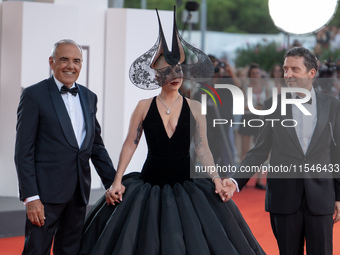 Venice Film Festival Director Alberto Barbera, Lady Gaga, and Biennale President Pietrangelo Buttafuoco attend the ''Joker: Folie a Deux'' r...