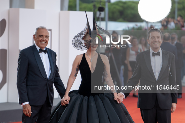 Venice Film Festival Director Alberto Barbera, Lady Gaga, and Biennale President Pietrangelo Buttafuoco attend the ''Joker: Folie a Deux'' r...