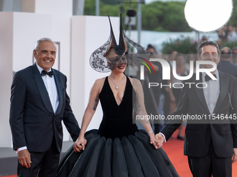 Venice Film Festival Director Alberto Barbera, Lady Gaga, and Biennale President Pietrangelo Buttafuoco attend the ''Joker: Folie a Deux'' r...