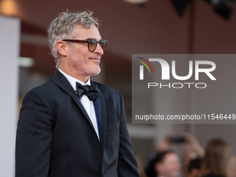 Joaquin Phoenix attends the ''Joker: Folie a Deux'' red carpet during the 81st Venice International Film Festival at Sala Grande in Venice,...