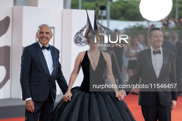 Venice Film Festival Director Alberto Barbera, Lady Gaga, and Biennale President Pietrangelo Buttafuoco attend the ''Joker: Folie a Deux'' r...