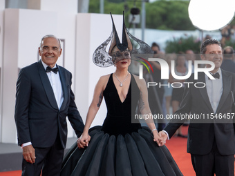 Venice Film Festival Director Alberto Barbera, Lady Gaga, and Biennale President Pietrangelo Buttafuoco attend the ''Joker: Folie a Deux'' r...