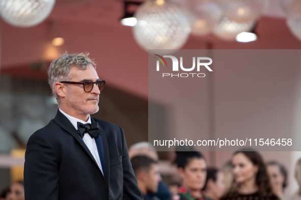 Joaquin Phoenix attends the ''Joker: Folie a Deux'' red carpet during the 81st Venice International Film Festival at Sala Grande in Venice,...