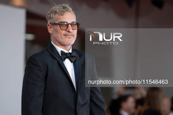 Joaquin Phoenix attends the ''Joker: Folie a Deux'' red carpet during the 81st Venice International Film Festival at Sala Grande in Venice,...