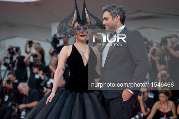 Lady Gaga and Michael Polansky attend the ''Joker: Folie a Deux'' red carpet during the 81st Venice International Film Festival at Sala Gran...