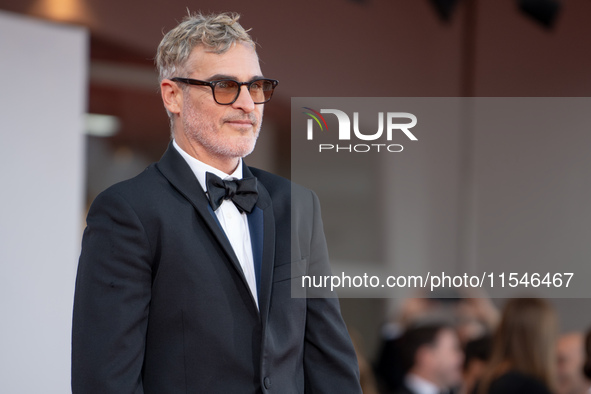 Joaquin Phoenix attends the ''Joker: Folie a Deux'' red carpet during the 81st Venice International Film Festival at Sala Grande in Venice,...