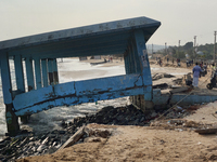 Platform is destroyed by strong ocean tides along Paruthiyoor Beach in Paruthiyoor, Kerala, India, on April 15, 2024. (