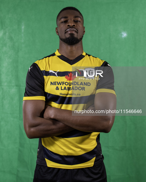 Emile Acquah of Barrow during the Barrow AFC Photocall at Holker Street in Barrow-in-Furness, on September 4, 2024. 