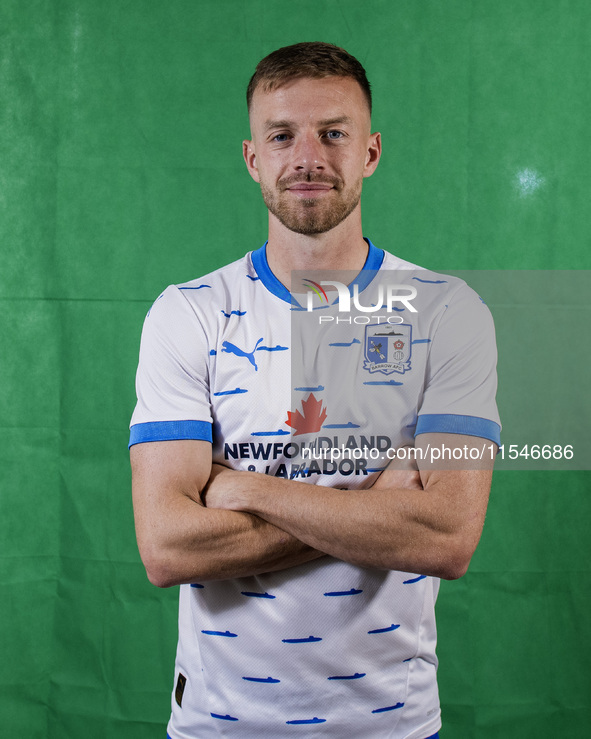 Elliot Newby of Barrow during the Barrow AFC Photocall at Holker Street in Barrow-in-Furness, England, on September 4, 2024. 