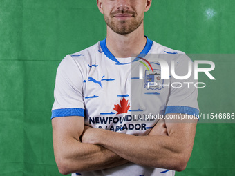 Elliot Newby of Barrow during the Barrow AFC Photocall at Holker Street in Barrow-in-Furness, England, on September 4, 2024. (