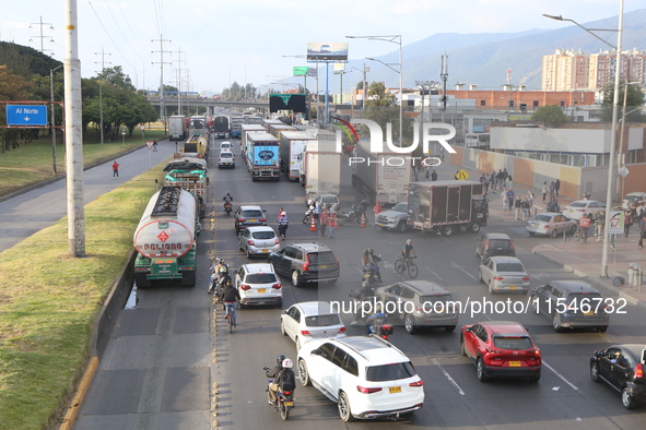 Several tractor-trailers block the northern highway in Bogota, Colombia, on September 4, 2024. Truckers mainly protest against the increase...