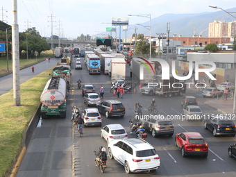 Several tractor-trailers block the northern highway in Bogota, Colombia, on September 4, 2024. Truckers mainly protest against the increase...