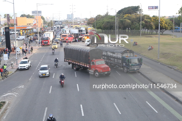 Several tractor-trailers block the northern highway in Bogota, Colombia, on September 4, 2024. Truckers mainly protest against the increase...