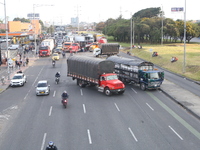 Several tractor-trailers block the northern highway in Bogota, Colombia, on September 4, 2024. Truckers mainly protest against the increase...