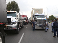 Several tractor-trailers block the northern highway in Bogota, Colombia, on September 4, 2024. Truckers mainly protest against the increase...