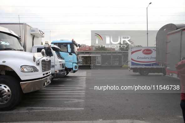 Several tractor-trailers block the northern highway in Bogota, Colombia, on September 4, 2024. Truckers mainly protest against the increase...