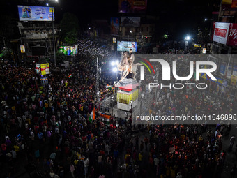 Citizens block a street in Kolkata, India, on September 4, 2024, to protest against the rape and murder of a second-year doctor at RG Kar Me...