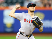 Boston Red Sox pitcher Tanner Houck #89 throws during the first inning of the baseball game against the New York Mets at Citi Field in Coron...