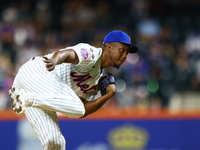 New York Mets relief pitcher Huascar Brazoban #43 throws during the sixth inning of the baseball game against the Boston Red Sox at Citi Fie...