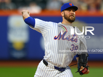 New York Mets starting pitcher Tylor Megill #38 throws during the first inning of the baseball game against the Boston Red Sox at Citi Field...