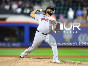 Boston Red Sox pitcher Kenley Jansen #74 throws during the eighth inning of the baseball game against the New York Mets at Citi Field in Cor...