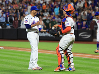 New York Mets relief pitcher Edwin Diaz #39 and catcher Francisco Alvarez #4 celebrate the Mets' 8-3 win in the baseball game against the Bo...