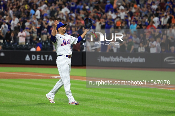 New York Mets relief pitcher Edwin Diaz #39 and catcher Francisco Alvarez #4 celebrate the Mets' 8-3 win in the baseball game against the Bo...