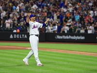 New York Mets relief pitcher Edwin Diaz #39 and catcher Francisco Alvarez #4 celebrate the Mets' 8-3 win in the baseball game against the Bo...