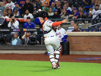 New York Mets catcher Francisco Alvarez #4 makes a catch during the ninth inning of the baseball game against the Boston Red Sox at Citi Fie...