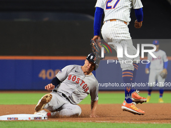 Rob Refsnyder #30 of the Boston Red Sox advances to third base during the eighth inning of the baseball game against the New York Mets at Ci...