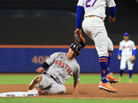 Rob Refsnyder #30 of the Boston Red Sox advances to third base during the eighth inning of the baseball game against the New York Mets at Ci...