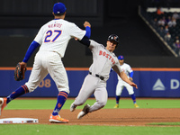 Rob Refsnyder #30 of the Boston Red Sox advances to third base during the eighth inning of the baseball game against the New York Mets at Ci...