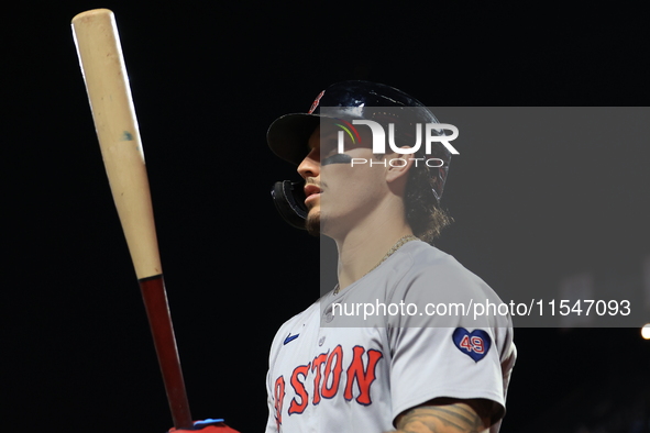 Boston Red Sox Jarren Duran #16 stands in the hole during the eighth inning of the baseball game against the New York Mets at Citi Field in...