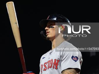 Boston Red Sox Jarren Duran #16 stands in the hole during the eighth inning of the baseball game against the New York Mets at Citi Field in...