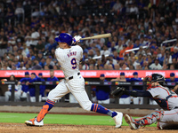 Brandon Nimmo #9 of the New York Mets singles during the fifth inning of the baseball game against the Boston Red Sox at Citi Field in Coron...