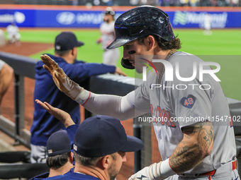 Boston Red Sox Jarren Duran #16 scores on a sacrifice fly during the third inning of the baseball game against the New York Mets at Citi Fie...