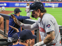 Boston Red Sox Jarren Duran #16 scores on a sacrifice fly during the third inning of the baseball game against the New York Mets at Citi Fie...