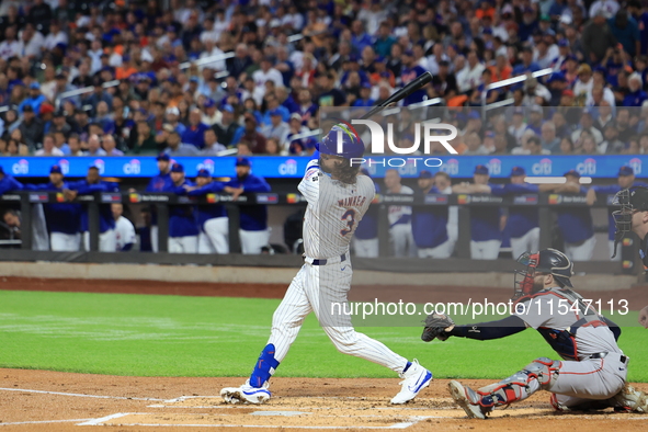 Jesse Winker of the New York Mets, #3, connects for a grand slam home run during the first inning of the baseball game against the Boston Re...