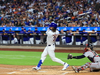 Jesse Winker of the New York Mets, #3, connects for a grand slam home run during the first inning of the baseball game against the Boston Re...