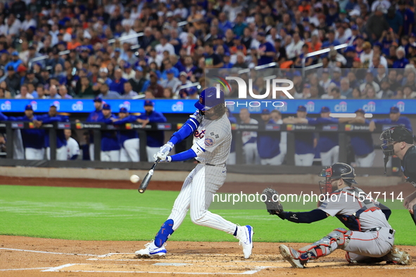 Jesse Winker of the New York Mets, #3, connects for a grand slam home run during the first inning of the baseball game against the Boston Re...