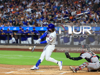 Jesse Winker of the New York Mets, #3, connects for a grand slam home run during the first inning of the baseball game against the Boston Re...